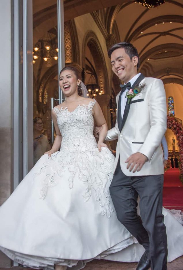 Wedding couple leave Church